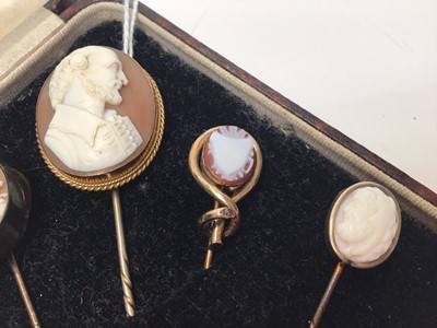 Lot 317 - Group of six Victorian cameo stick pins to include a cameo depicting a jockey on racehorse, three carved hardstone stick pins and two further carved shell cameo stick pins (6)