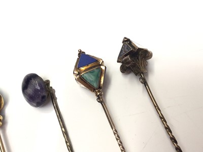 Lot 318 - Group of six antique stick pins to include an Art Nouveau 9ct gold and turquoise snake by Murrle Bennett, one other Victorian snake stick pin with gold snake and turquoise glass cabochon, Victorian...