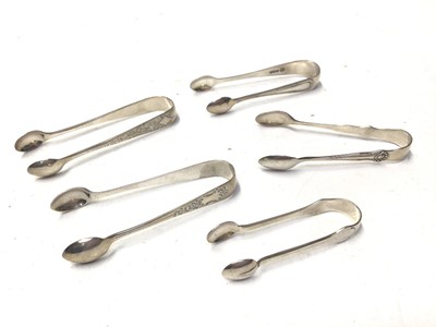 Lot 334 - Twenty pairs of Victorian and early 20th century silver sugar tongs,  various dates and makers, all at approximately 10oz, (20)