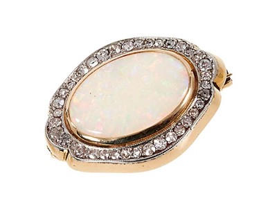 Lot 511 - Opal and diamond brooch with an oval opal cabochon measuring approximately 17.4 x 12mm surrounded by a border of old cut diamonds in gold setting. 28 x 21 mm