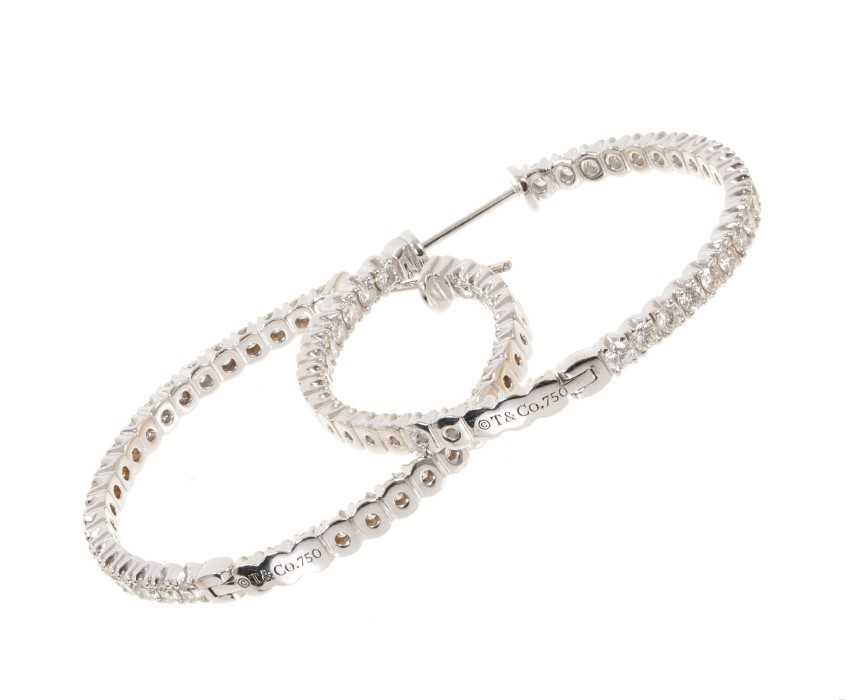 Lot 508 - Tiffany & Co. pair of white gold diamond Metro Hoop Earrings, each set with thirty nine brilliant cut diamonds, estimated to weigh approximately 1.17cts, in 18ct white gold setting stamped T&Co. 75...