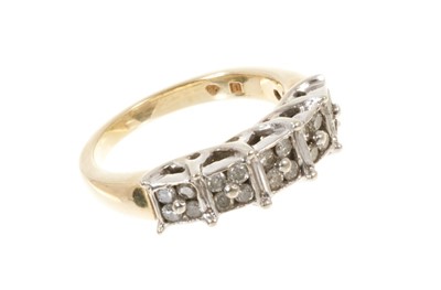 Lot 587 - Diamond dress ring with five square clusters of brilliant cut diamonds on gold shank. Ring size N.