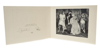 Lot 31 - H.M. Queen Elizabeth II and H.R.H. The Duke of Edinburgh - signed 1964 Christmas card with twin Royal ciphers to cover, photograph of the Royal Family to the interior with The Queen with the infant...