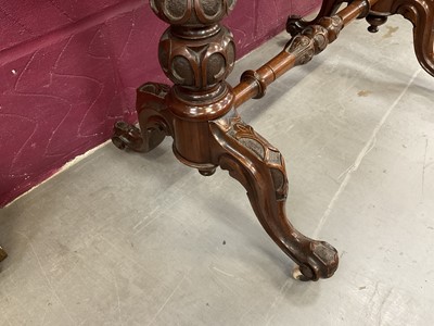Lot 1213 - Victorian burr walnut veneered card table with shaped fold-over top on carved and turned supports with turned stretcher on cabriole legs terminating on original ceramic casters