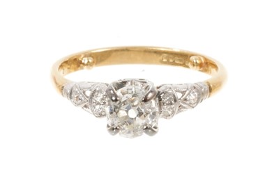 Lot 530 - Diamond single stone ring with an old cut diamond estimated to weigh approximately 0.53cts in platinum claw setting with diamond set shoulders on 18ct yellow gold shank.