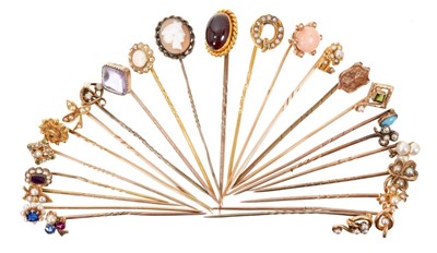 Lot 533 - Collection of Victorian and Edwardian stick pins to include an opal and diamond cluster, peridot and seed pearl, various diamond and gem-set stick pins (24)