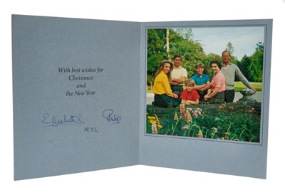 Lot 37 - H.M. Queen Elizabeth II and H.R.H. The Duke of Edinburgh, signed 1972 Christmas card with twin gilt Royal ciphers to cover, colour photograph of the Royal Family in a garden to the interior.