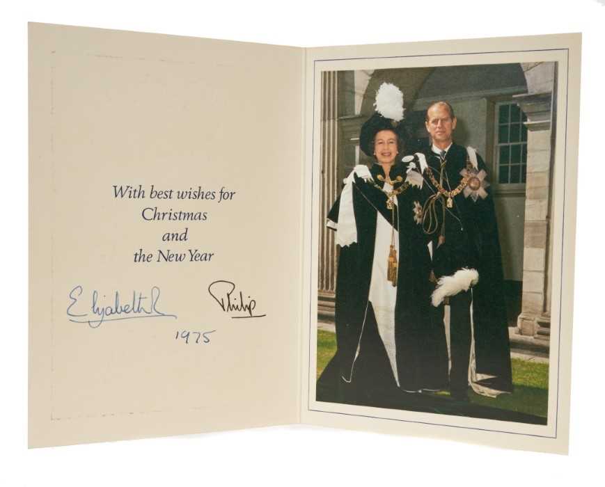 Lot 40 - H.M. Queen Elizabeth II and H.R.H. The Duke of Edinburgh, signed 1975 Christmas card with twin gilt Royal ciphers to cover, colour photograph of the Queen and Duke in their Order of St Patrick robe...