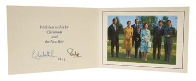 Lot 41 - H.M. Queen Elizabeth II and H.R.H. The Duke of Edinburgh, signed 1976 Christmas card with twin gilt Royal ciphers to cover, colour photograph of the Royal Family to interior