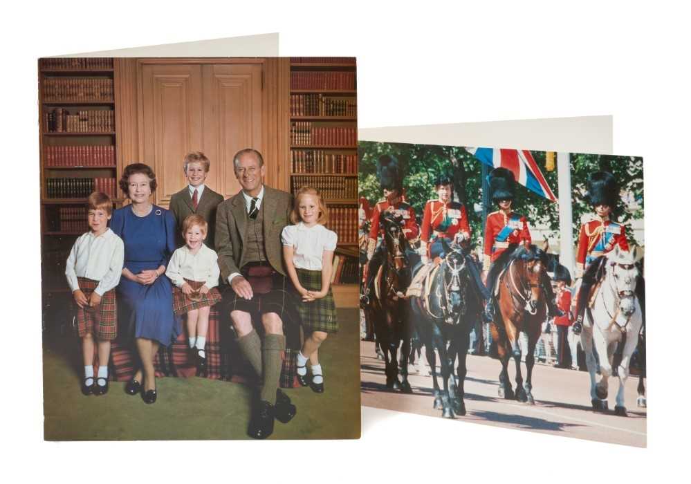 Lot 49 - H.M.Queen Elizabeth II and H.R.H.The Duke of Edinburgh, two signed 1986 and 1987 Christmas cards with twin gilt Royal ciphers to interiors and colour photographs of the Royal Family to fronts