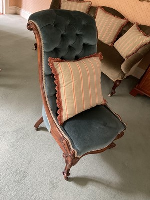 Lot 1239 - Victorian button upholstered scroll back rosewood chair, raised on cabriole legs and castors