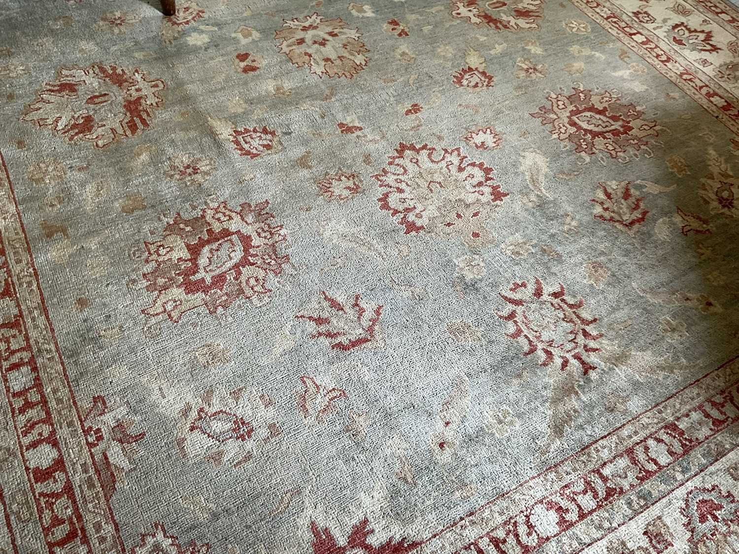 Lot 1275 - Good quality Ushak style carpet, with meandering lotus leaf ornament on moss green ground, 310 x 250cm