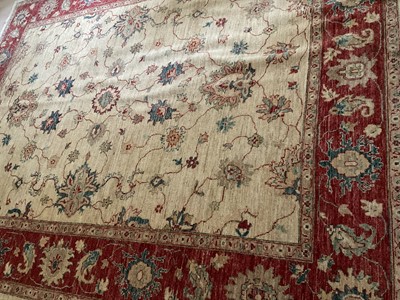 Lot 1269 - Ushak style carpet, with lotus flower design on cream ground in borders, 246 x 194cm