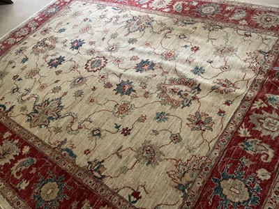 Lot 1269 - Ushak style carpet, with lotus flower design on cream ground in borders, 246 x 194cm