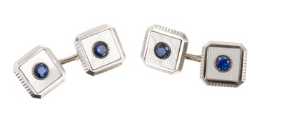 Lot 593 - Pair of 9ct white gold mother of pearl and sapphire cufflinks, previously owned by Ronnie Corbett