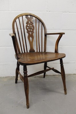 Lot 1241 - 19th century fruitwood and elm wheelback Windsor chair