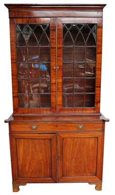 Lot 1374 - Early 19th century mahogany two height bookcase