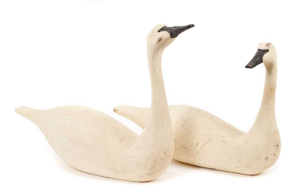 Lot 847 - Follower of Guy Taplin, pair of carved wood swans