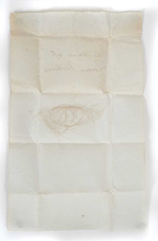 Lot 62 - H.M.Queen Victoria, lock of hair in original folded paper packet inscribed in ink 'The Hair of Queen Victoria'