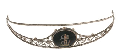 Lot 549 - Early 19th century continental silver and pietra dura tiara/head band with a circular panel depicting a classical figure, on silver wire work and rope twist band.