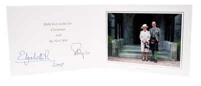 Lot 89 - H.M.Queen Elizabeth II and H.R.H. The Duke of Edinburgh, signed 2008 Christmas card with twin gilt Royal ciphers to cover and colour photograph of the Royal couple at Craithie Kirk to the interior-...