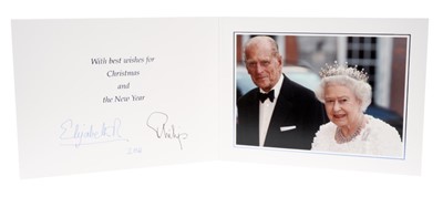 Lot 92 - H.M.Queen Elizabeth II and H.R.H. The Duke of Edinburgh, signed 2011 Christmas card with twin gilt Royal ciphers to cover and colour photograph of the Royal Couple to the interior- with envelope