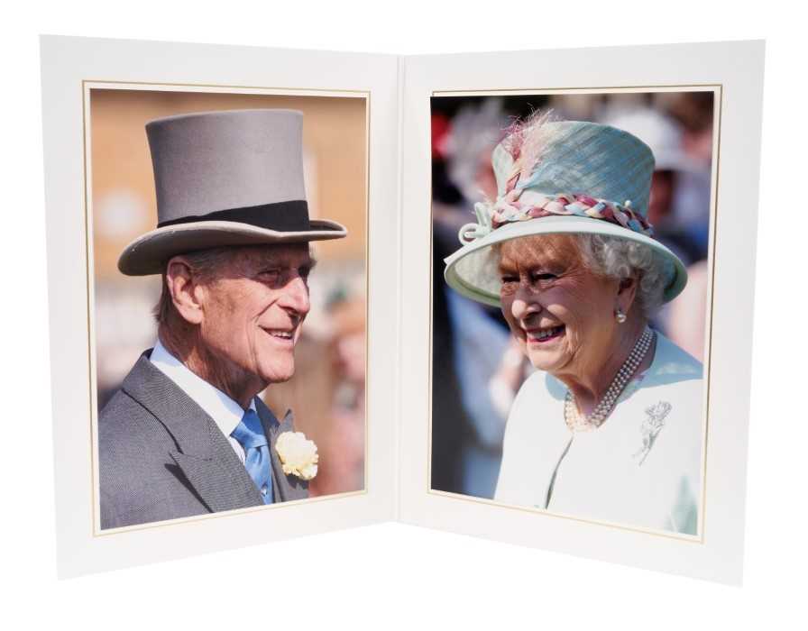 Lot 93 - H.M.Queen Elizabeth II and H.R.H. The Duke of Edinburgh, signed 2013 Christmas card with twin gilt Royal ciphers to cover and colour photograph of the Royal Couple to the interior