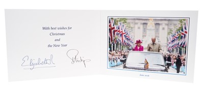 Lot 96 - H.M.Queen Elizabeth II and H.R.H. The Duke of Edinburgh, signed 2016 Christmas card with twin gilt Royal ciphers to cover and colour photograph of the Royal Couple parading to the interior- with en...