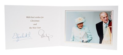 Lot 98 - H.M.Queen Elizabeth II and H.R.H. The Duke of Edinburgh, signed 2018 Christmas card with twin gilt Royal ciphers to cover and colour photograph of the Royal couple leaving church to the interior- w...