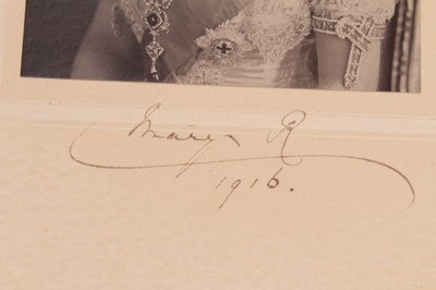 Lot 124 - H.M.Queen Mary, signed presentation portrait photograph of the Queen wearing jewels and The Order of The Garter, signed in ink on mount ' Mary R 1916'- un-framed 29 x 19 cm