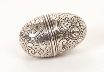 Lot 428 - early 19th century silver vinaigrette in the form of an acorn with chased floral decoration.