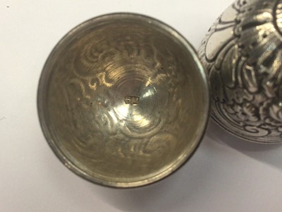 Lot 428 - early 19th century silver vinaigrette in the form of an acorn with chased floral decoration.