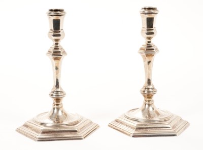 Lot 433 - Pair contemporary silver taper sticks of hexagonal form, in the Georgian style (London 1966).