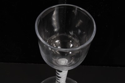 Lot 261 - 18th century wine glass with plain bowl, opaque twist stem on splayed foot 15cm