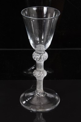 Lot 262 - 18th century wine glass with bell-shaped bowl, double knoped air twist stem on splayed foot 16 cm