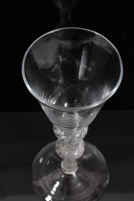 Lot 262 - 18th century wine glass with bell-shaped bowl, double knoped air twist stem on splayed foot 16 cm