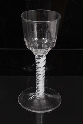 Lot 263 - 18th century wine glass with moulded bowl, double opaque twist stem on splayed foot 15cm