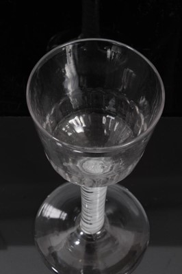 Lot 263 - 18th century wine glass with moulded bowl, double opaque twist stem on splayed foot 15cm