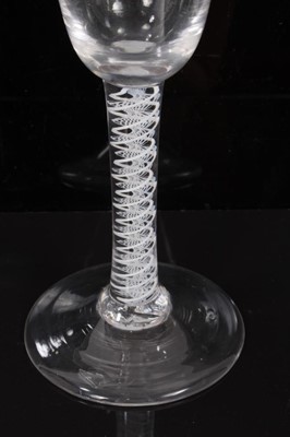 Lot 264 - 18th century wine glass with plain bowl, double opaque twist stem on splayed foot 14.5cm