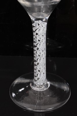 Lot 266 - 18th century wine glass with plain bowl, double opaque twist stem on splayed foot 14cm