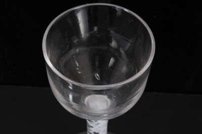 Lot 266 - 18th century wine glass with plain bowl, double opaque twist stem on splayed foot 14cm