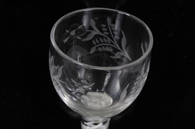 Lot 267 - 18th century wine glass with floral spray engraved bowl on double opaque twist stem on splayed foot 13cm
