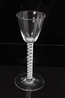 Lot 269 - 18th century wine glass with plain bowl, double opaque twist stem on splayed foot 16 cm
