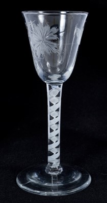 Lot 270 - 18th century wine glass with vine and butterfly engraved bowl, double opaque twist stem on splayed foot 15.6cm