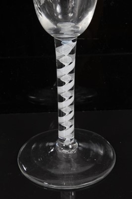 Lot 270 - 18th century wine glass with vine and butterfly engraved bowl, double opaque twist stem on splayed foot 15.6cm