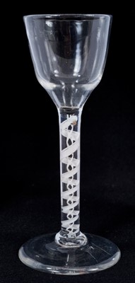 Lot 273 - 18th century wine glass with plain bowl, double opaque twist stem on splayed foot 15cm