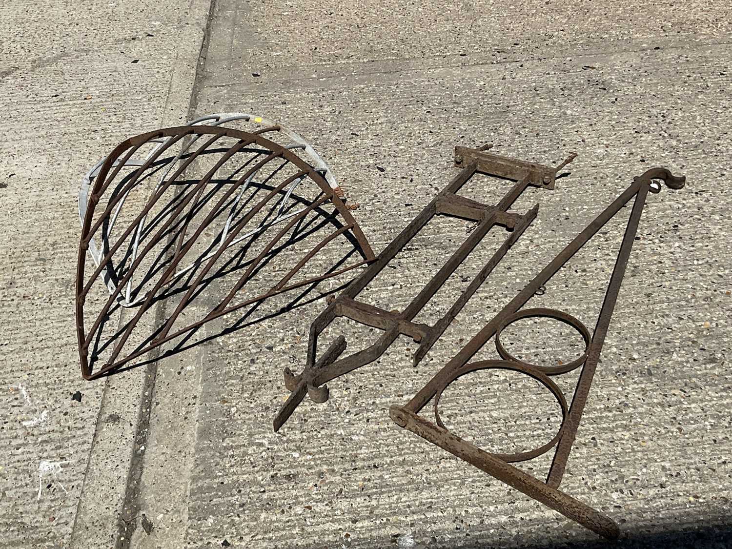 Lot 1329 Two 19th century iron swing sign brackets