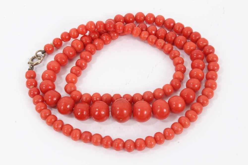 Lot 633 Antique coral bead necklace with a string of