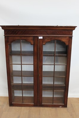 Lot 1051 - Twentieth century Mahogany glazed two door display cabinet