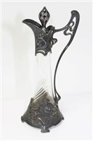 Lot 868 - Art Nouveau pewter mounted decanter and...